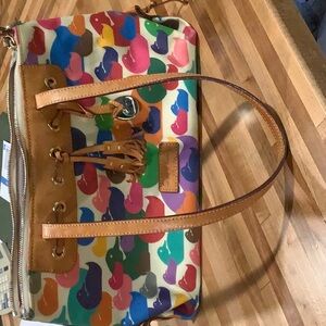 Multi colored Dooney and Bourke purse leather trim